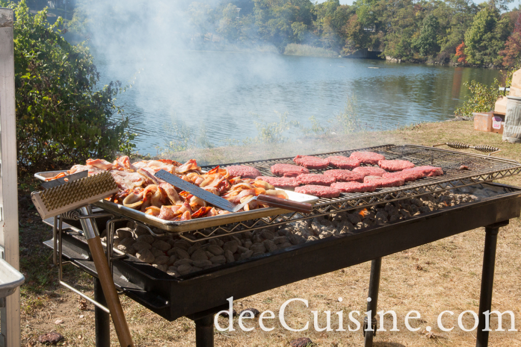 Burgers grilling by the river