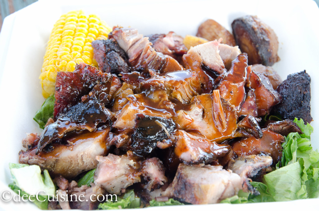 Wild Boar with corn and breadfruit in Kauai, Hawaii