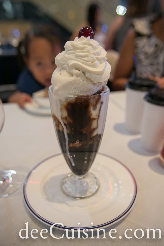 Brownie Sundae with vanilla ice cream, fudge brownies, Cracker Jack, pretzels, chocolate sauce 