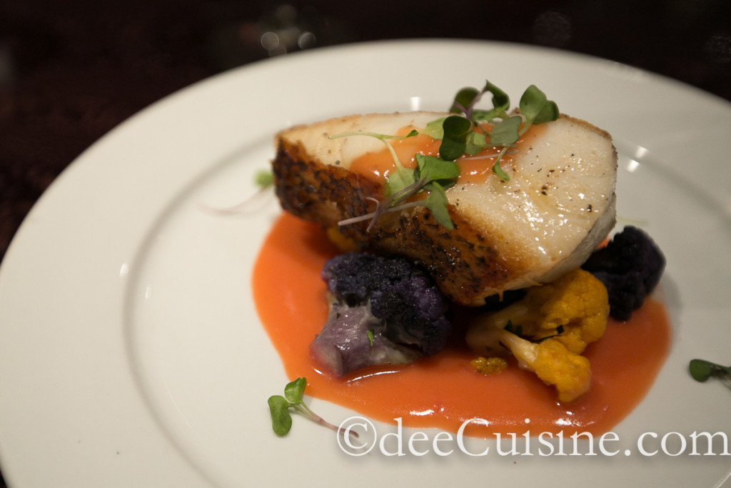 Chilean Sea Bass with Tri-colored Cauliflower served in a Blood Orange Cream Sauce