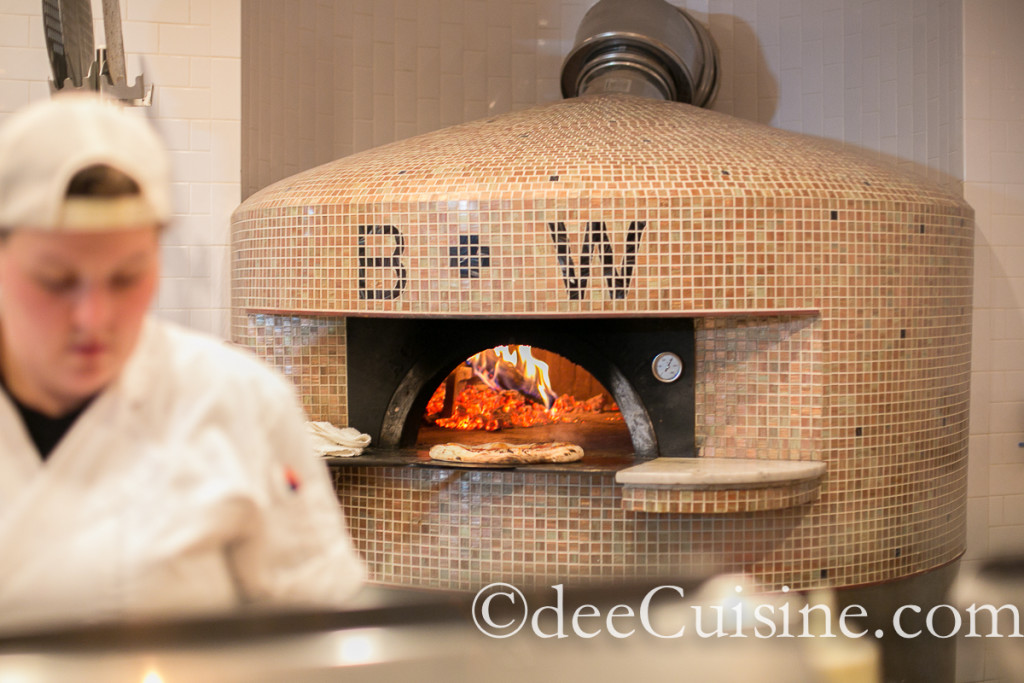 Pizza is made in this wood-fired pizza oven