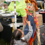Kai chatting with the scarecrow of Castello of Niantic